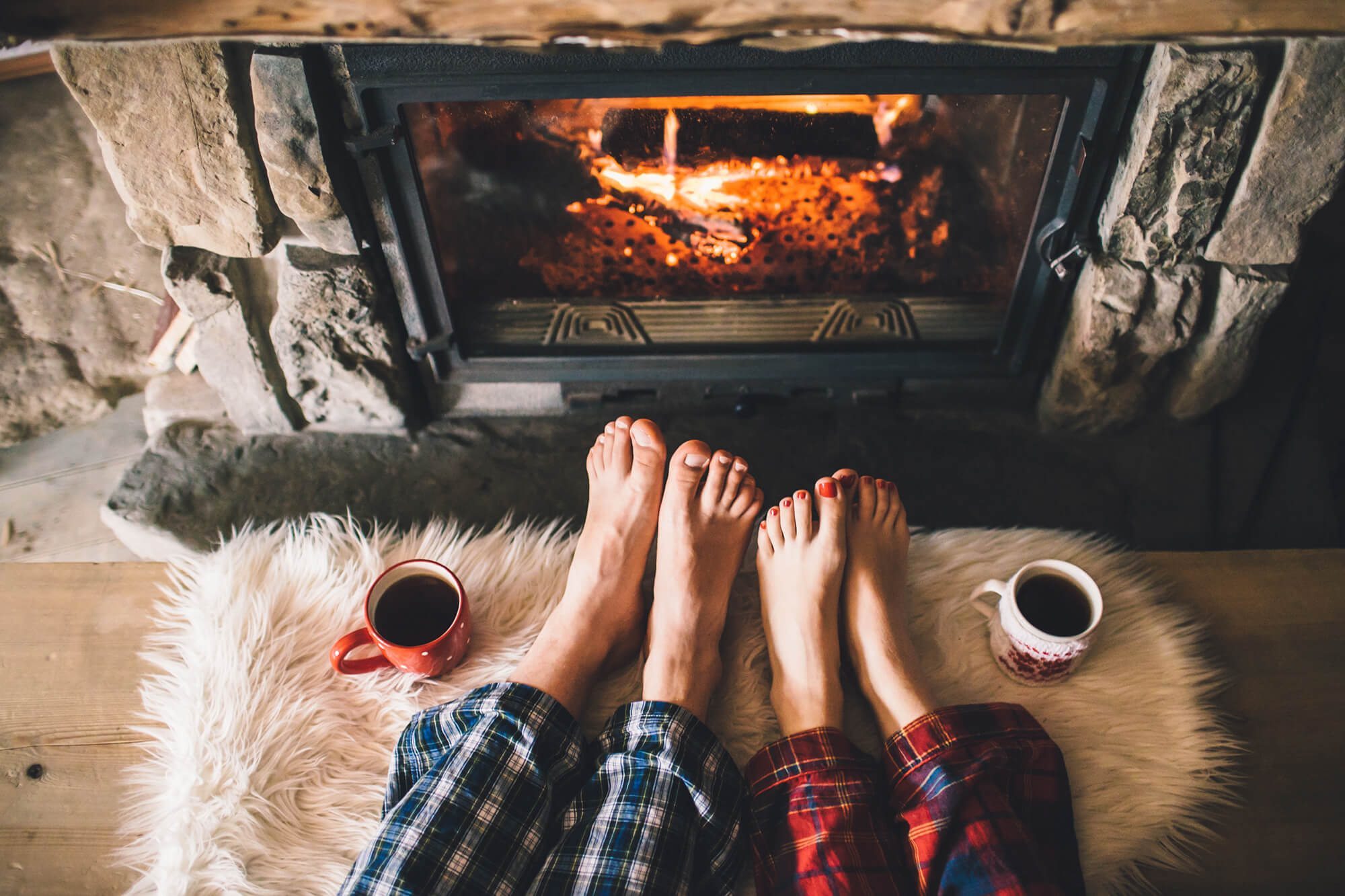 Staying warm by the fireplace | Stiles Heating, Cooling, & Plumbing